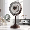 image:imageOVENTE 7 Lighted Tabletop Makeup Mirror 1X amp 7X Magnifier Spinning Double Sided Round LED Great for Vanity Bath amp Bedroom Battery Powered Polished Chrome MCT70CH1X7X Pack of 2Antique Bronze