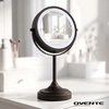 image:imageOVENTE 7 Lighted Tabletop Makeup Mirror 1X amp 7X Magnifier Spinning Double Sided Round LED Great for Vanity Bath amp Bedroom Battery Powered Polished Chrome MCT70CH1X7X Pack of 2Antique Bronze