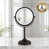 image:imageOVENTE 7 Lighted Tabletop Makeup Mirror 1X amp 7X Magnifier Spinning Double Sided Round LED Great for Vanity Bath amp Bedroom Battery Powered Polished Chrome MCT70CH1X7X Pack of 2Antique Bronze